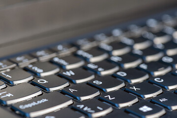 Image showing Macro shot of laptop with black keyboard