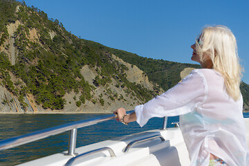 Image showing Blonde poses on a white yacht