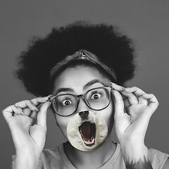 Image showing Contemporary artwork collage concept. Portrait of woman with pet\'s tongue sticked out, bw style