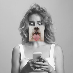 Image showing Contemporary artwork collage concept. Portrait of woman with pet\'s tongue sticked out, bw style