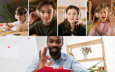 Image showing Group of kids, class studying by group video call, use video conference with each other and teacher