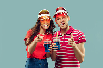 Image showing Beautiful couple isolated on blue studio background