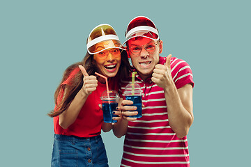 Image showing Beautiful couple isolated on blue studio background