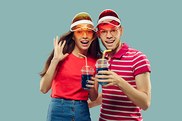 Image showing Beautiful couple isolated on blue studio background