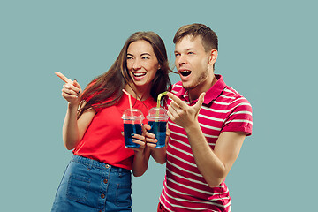 Image showing Beautiful couple isolated on blue studio background