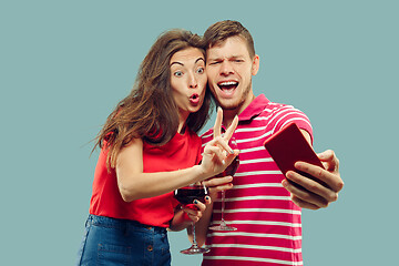 Image showing Beautiful couple isolated on blue studio background