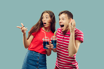 Image showing Beautiful couple isolated on blue studio background