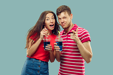 Image showing Beautiful couple isolated on blue studio background