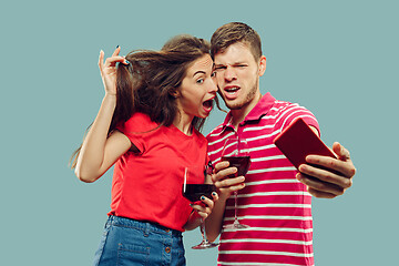 Image showing Beautiful couple isolated on blue studio background