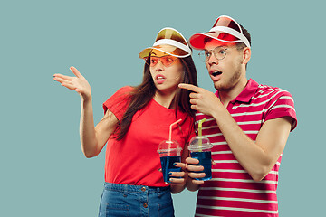 Image showing Beautiful couple isolated on blue studio background