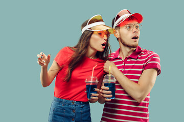 Image showing Beautiful couple isolated on blue studio background