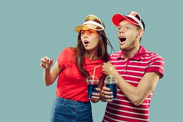 Image showing Beautiful couple isolated on blue studio background