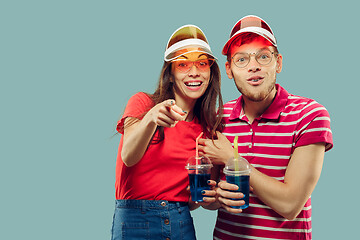 Image showing Beautiful couple isolated on blue studio background