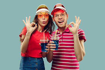 Image showing Beautiful couple isolated on blue studio background