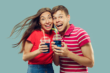 Image showing Beautiful couple isolated on blue studio background