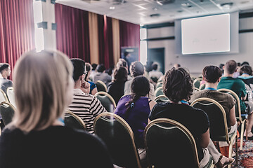 Image showing Audience in lecture hall participating at business conference.