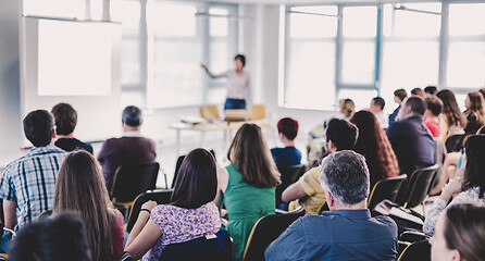 Image showing Speaker giving presentation on business conference.