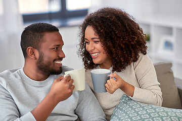 Image showing african american couple drinking coffee at home