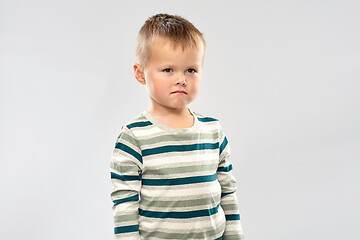 Image showing portrait of sad little boy in striped shirt