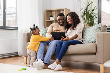 Image showing african american family with tablet pc at home