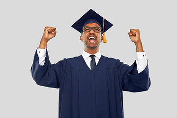 Image showing happy indian graduate student celebrating success