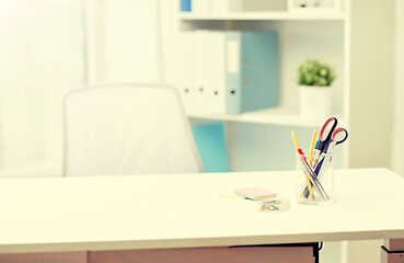 Image showing stationery on table in office interior