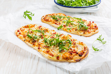 Image showing Tarte Flambee - flat bread (Flammkuchen) with bacon, onion, champignon and cheese