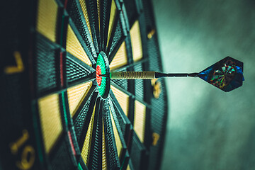 Image showing Bullseye is a target of business. Dart as opportunity and Dartboard as the target challenge in business marketing as concept