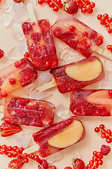 Image showing Homemade frozen various red berries natural juice popsicles - paletas - ice pops
