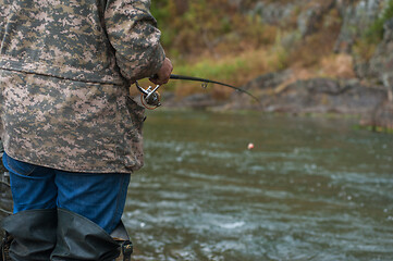 Image showing Fisherman at the Altai river