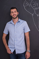 Image showing portrait of man in front of black chalkboard