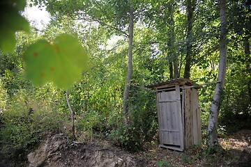 Image showing wooden retro outdoor toilet