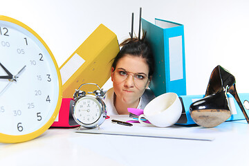 Image showing Young woman getting a lot of work and deadline