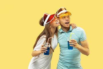 Image showing Beautiful couple isolated on yellow studio background