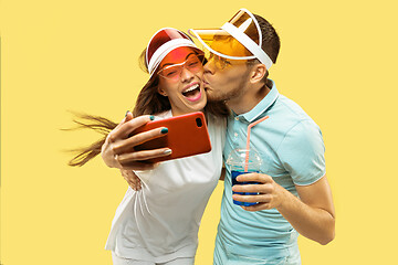 Image showing Beautiful couple isolated on yellow studio background