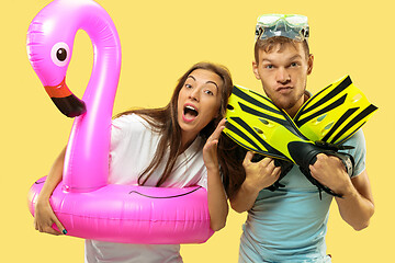 Image showing Beautiful couple isolated on yellow studio background