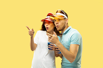 Image showing Beautiful couple isolated on yellow studio background