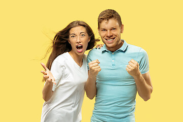 Image showing Beautiful couple isolated on yellow studio background