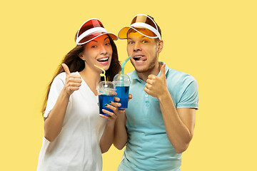 Image showing Beautiful couple isolated on yellow studio background