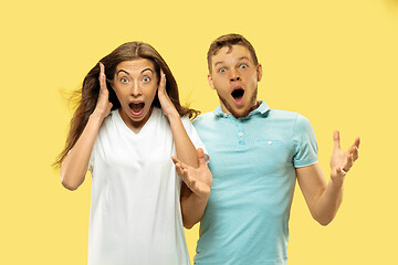 Image showing Beautiful couple isolated on yellow studio background