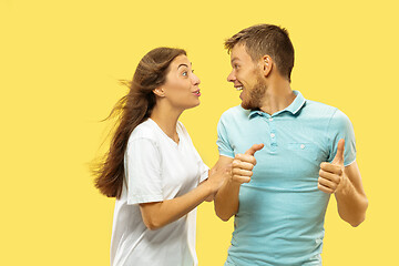 Image showing Beautiful couple isolated on yellow studio background