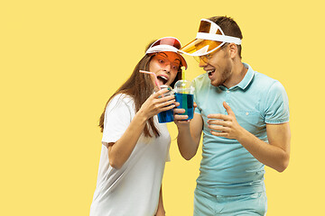 Image showing Beautiful couple isolated on yellow studio background