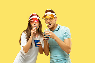 Image showing Beautiful couple isolated on yellow studio background