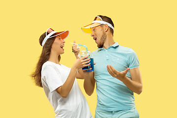 Image showing Beautiful couple isolated on yellow studio background