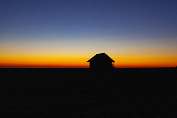 Image showing Old barn on the field at sunrise