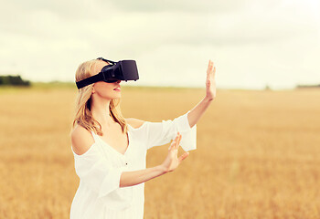 Image showing woman in virtual reality headset on cereal field