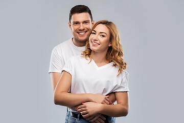 Image showing portrait of happy couple in white t-shirts