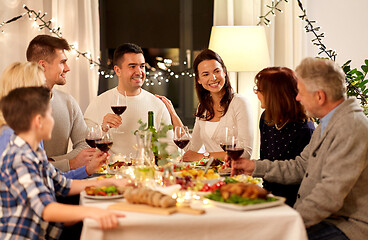 Image showing happy family having dinner party at home