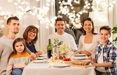 Image showing happy family having dinner party at home