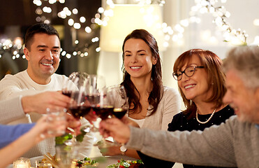 Image showing happy family having dinner party at home